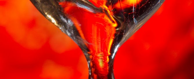 Melting Ice with a drop falling disconnecting